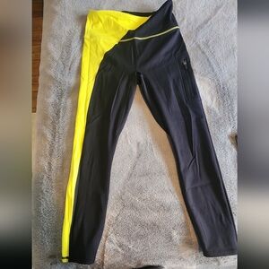 Fabletics Black with Neon Yellow Motion365 Athletic Leggings